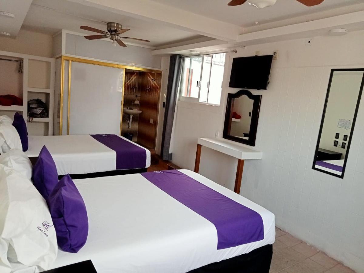 Hotel Posada Laura ซาน ฮวน เดล ริโอ ภายนอก รูปภาพ